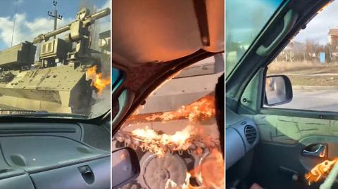 Kobieta rzuca przez okno jadącego samochodu koktajl Mołotowa w rosyjski wóz bojowy 