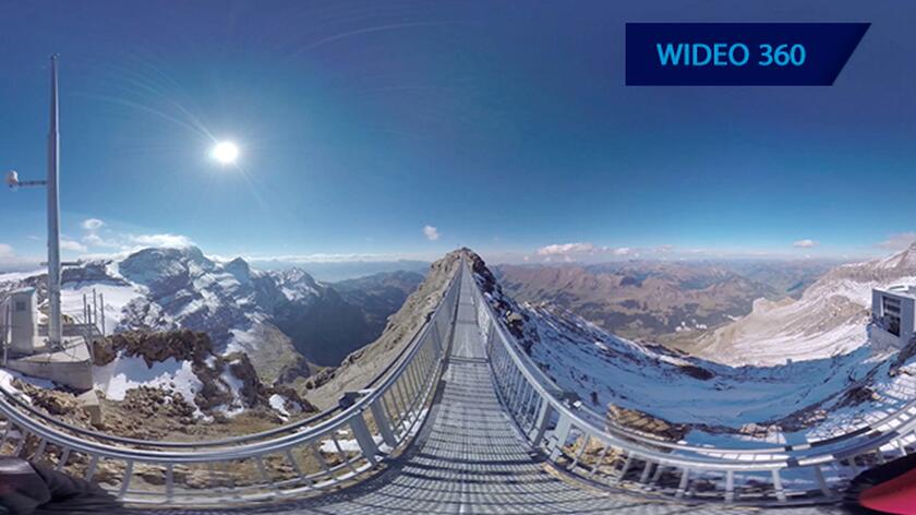 Ekstremalny spacer między alpejskimi szczytami. Zobacz to na wideo 360