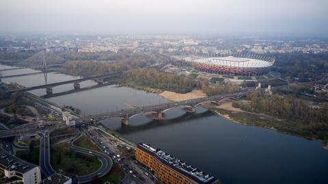 National Stadium in Warsaw displays caption saying "Stay at Home"