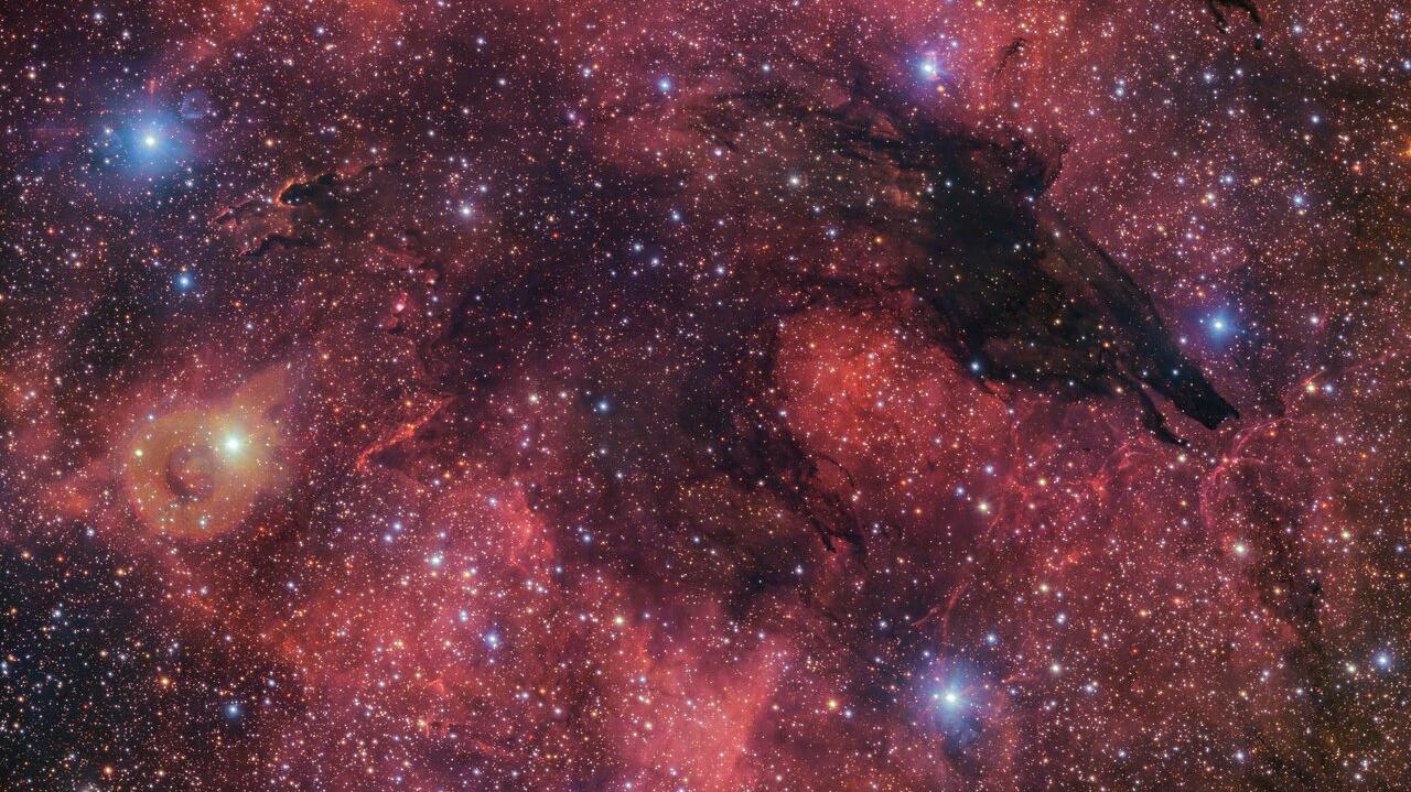 Stunning Image of the Dark Wolf Nebula Revealed by European Southern Observatory: Halloween Unveils a Cosmic Canine